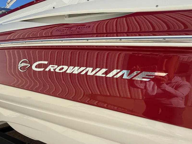 Slide: The Image of Red Crownline 252 EX boat, 2012 model, side view. - 3