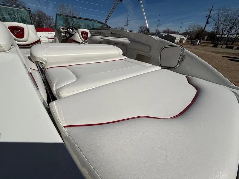 Slide: The Image of Interior of a 2012 Crownline 252 EX boat with white upholstery. - 35