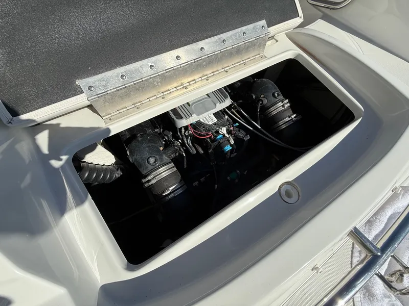 Slide: The Image of Engine compartment of a 2012 Crownline 252 EX boat. - 36
