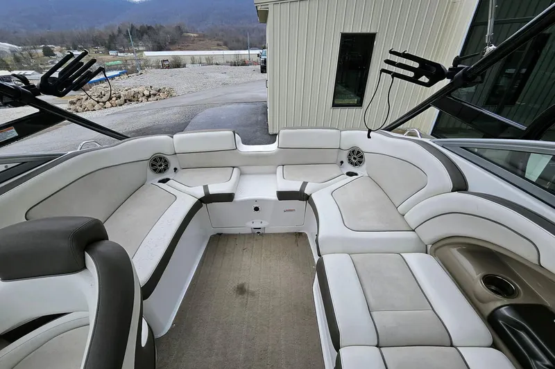 Slide: The Image of 2013 Yamaha Boats 242 Limited interior with spacious seating and modern design. - 8