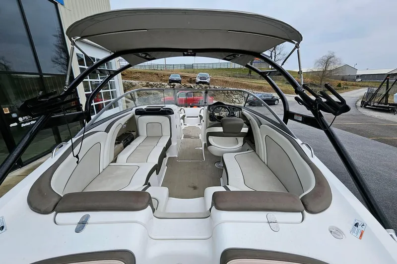 Slide: The Image of 2013 Yamaha Boats 242 Limited interior with spacious seating and sleek design. - 9