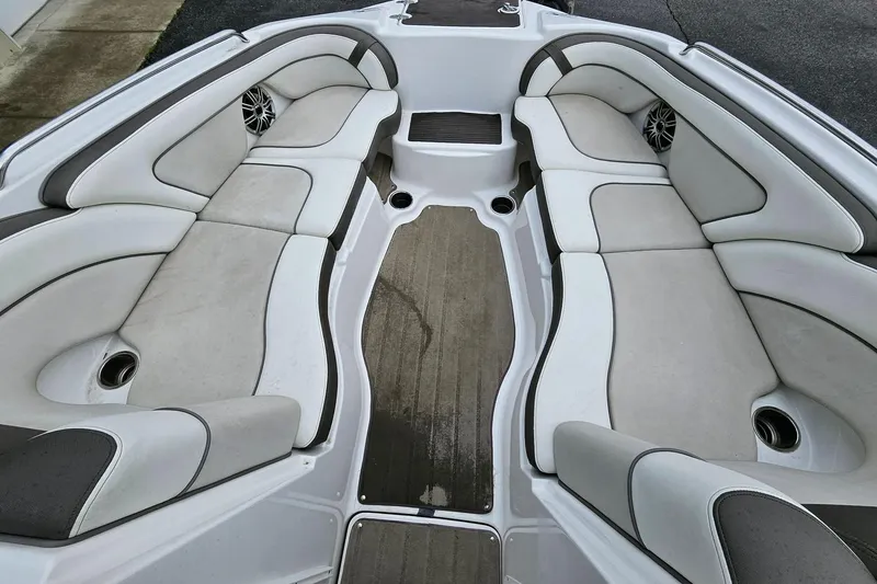 Slide: The Image of 2013 Yamaha Boats 242 Limited interior with spacious seating and modern design. - 6