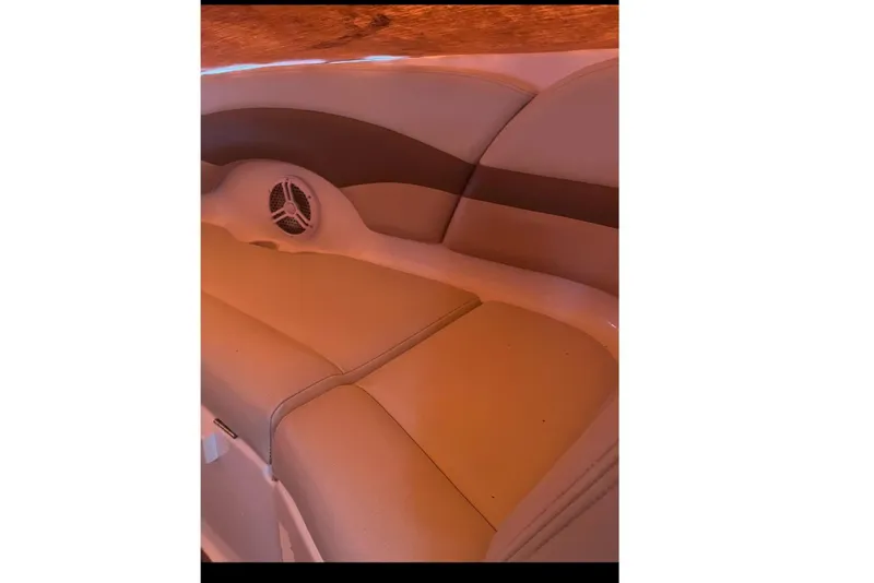 Slide: The Image of Interior of a 2004 Chaparral 260 SSi boat with speaker. - 11