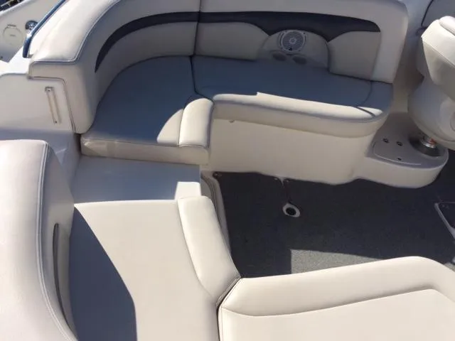 Slide: The Image of Interior of a 2004 Chaparral 260 SSi boat with gray upholstery. - 7