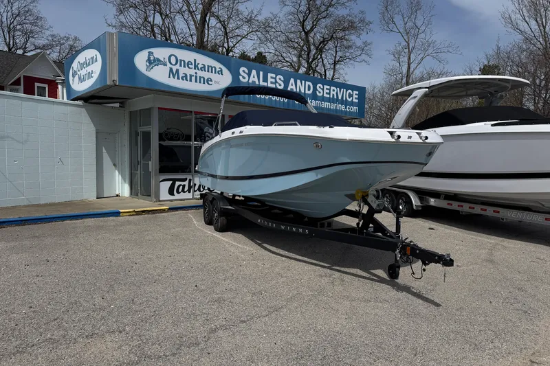 Slide: The Image of 2025 Four Winns HD3 boat at Onekama Marine sales and service location. - 1