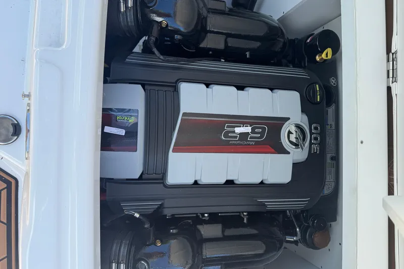 Slide: The Image of Engine compartment of 2025 Four Winns HD3 boat with MerCruiser 6.2L engine. - 17