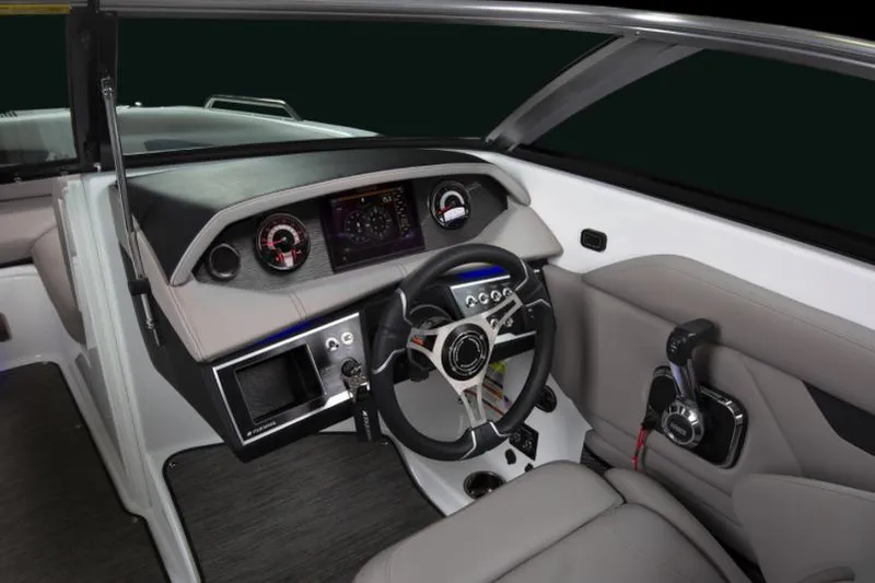 Slide: The Image of Manufacturer Provided Image: 2025 Four Winns HD3 boat interior with modern dashboard and steering wheel. - 24