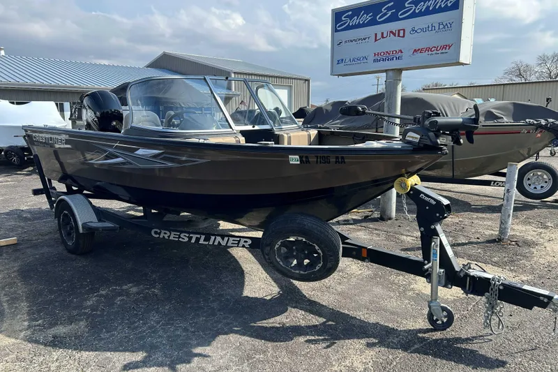 Slide: The Image of 2017 Crestliner 1850 Super Hawk boat on trailer at dealership. - 4