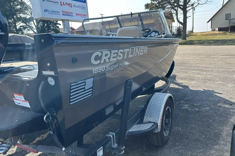 Slide: The Image of 2017 Crestliner 1850 Super Hawk boat on trailer, parked outdoors. - 5