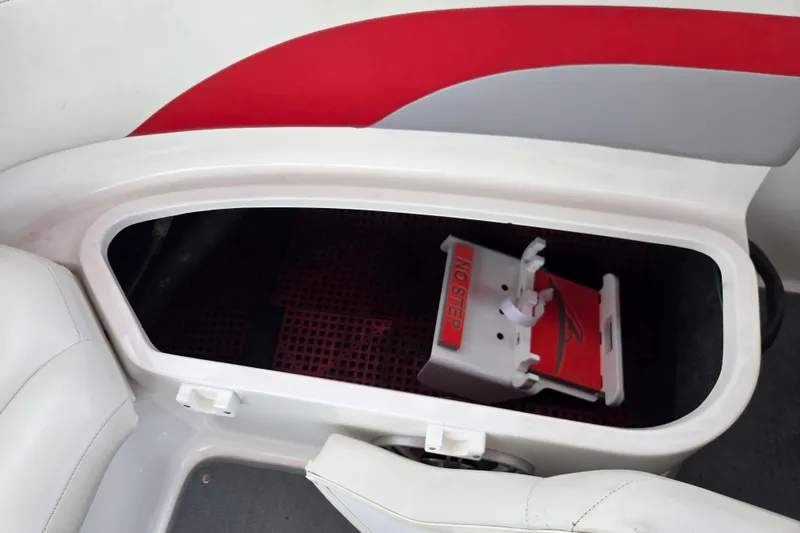 Slide: The Image of 2005 Yamaha AR230 boat storage compartment with "No Step" warning sign. - 15