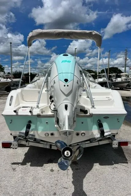 Slide: The Image of 2024 Key West 203 DFS boat with outboard motor, on trailer. - 10