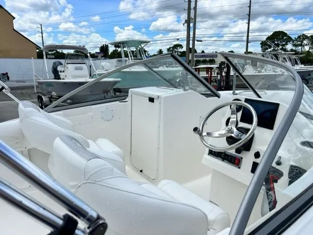 Slide: The Image of Interior view of 2024 Key West 203 DFS boat with helm console. - 8