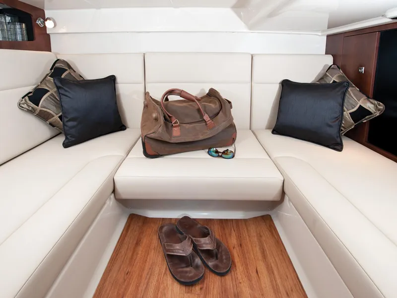 Slide: The Image of Manufacturer Provided Image: Luxurious interior of 2013 Chaparral 310 Signature with leather seating and stylish decor. - 11