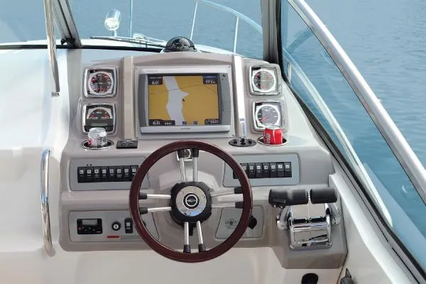 Slide: The Image of Manufacturer Provided Image: 2013 Chaparral 310 Signature boat dashboard with GPS navigation system. - 4