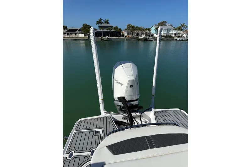 Slide: The Image of 2020 Monterey 255SS Super Sport boat with Mercury engine on calm water. - 15