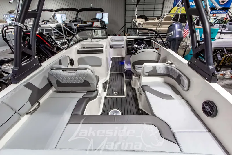 Slide: The Image of 2023 Bayliner VR6 Bowrider I/O interior with modern seating and sleek design at Lakeside Marina. - 12