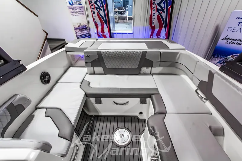 Slide: The Image of 2023 Bayliner VR6 Bowrider I/O interior with gray seating and modern design. - 13