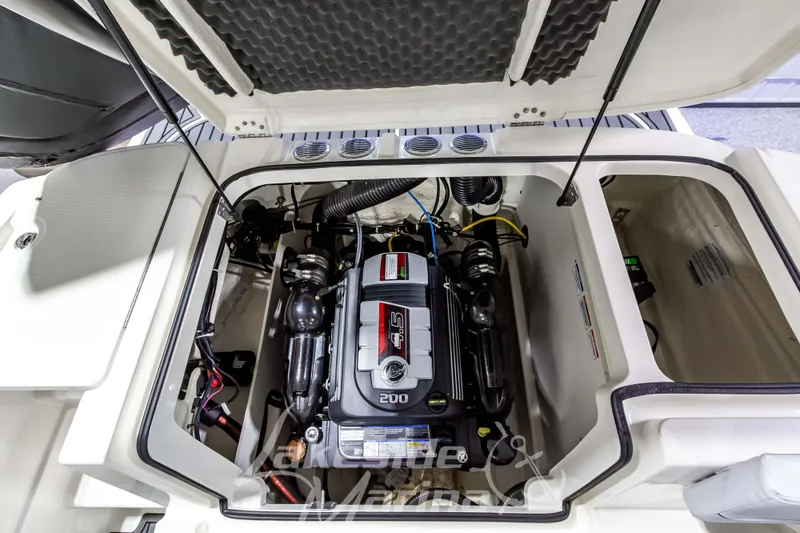 Slide: The Image of 2023 Bayliner VR6 Bowrider I/O engine compartment, showcasing powerful inboard motor. - 16