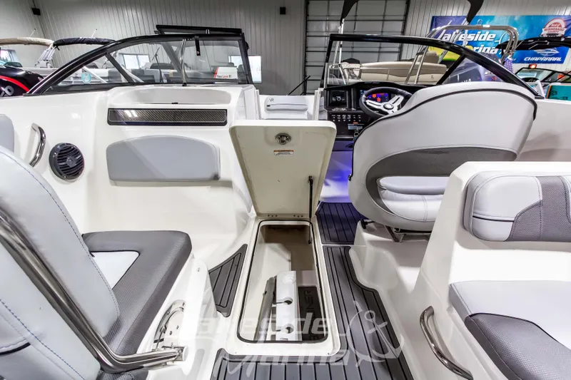 Slide: The Image of 2023 Bayliner VR6 Bowrider I/O interior with seating and storage compartments. - 20