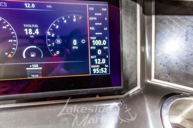 Slide: The Image of Dashboard of 2023 Bayliner VR6 Bowrider I/O showing fuel and engine data. - 23