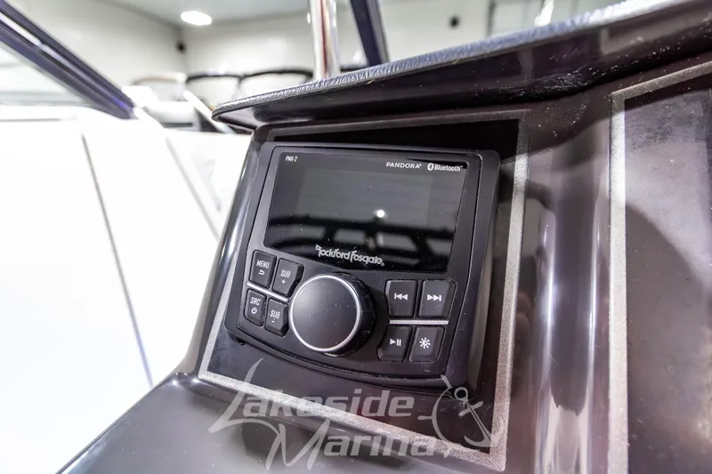 Slide: The Image of 2023 Bayliner VR6 Bowrider I/O featuring Rockford Fosgate audio system with Bluetooth connectivity. - 24