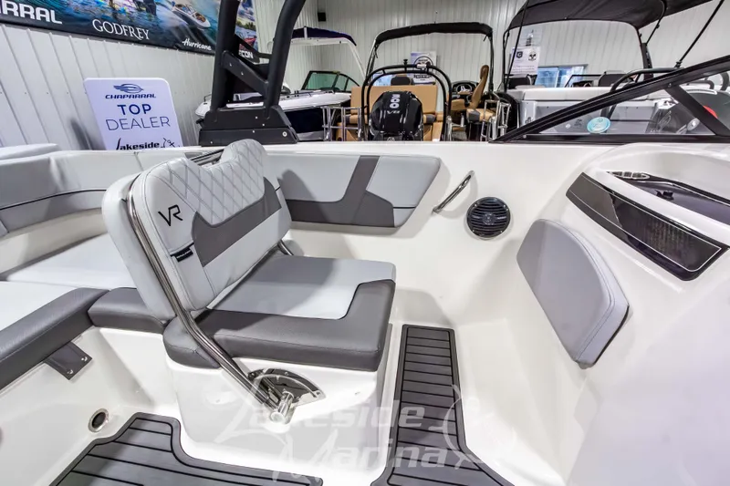 Slide: The Image of 2023 Bayliner VR6 Bowrider I/O interior with gray seating and modern design. - 26