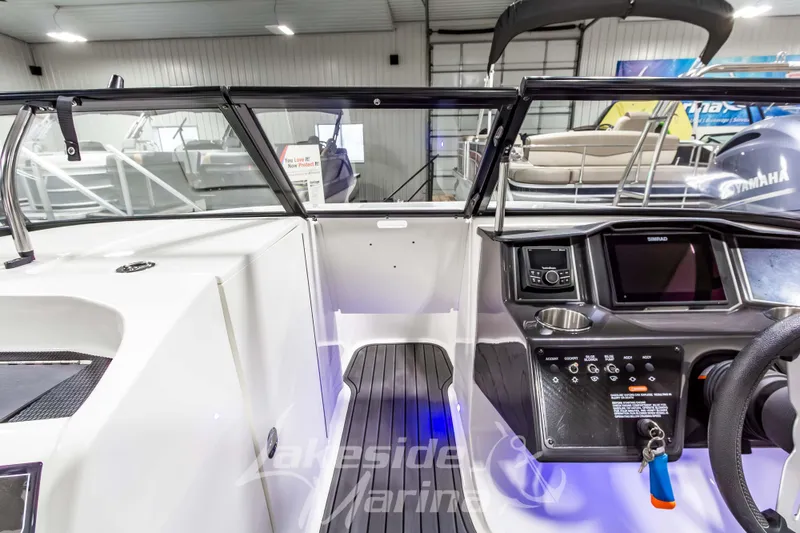 Slide: The Image of 2023 Bayliner VR6 Bowrider I/O dashboard with modern controls and sleek design. - 31