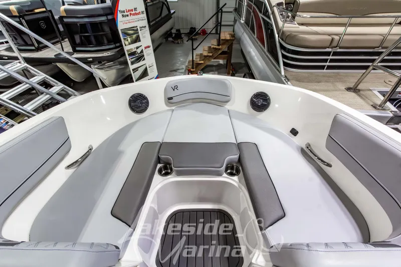 Slide: The Image of 2023 Bayliner VR6 Bowrider I/O interior with seating and cup holders at Lakeside Marina. - 32