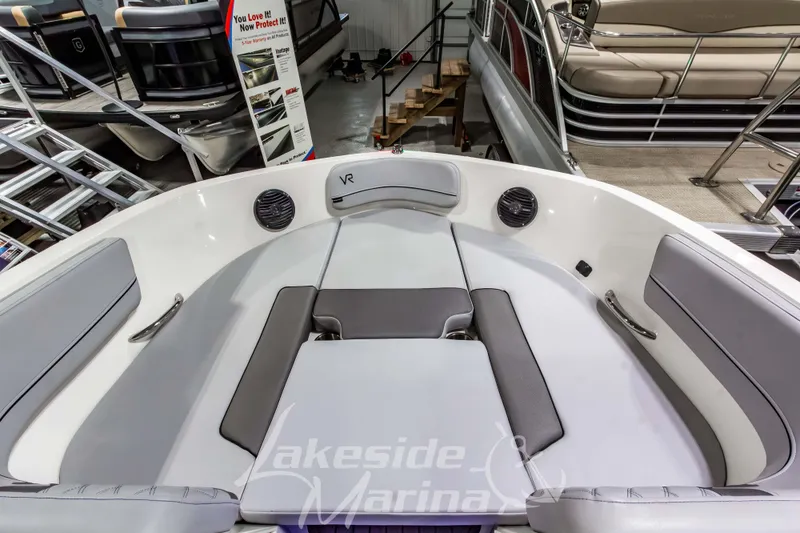 Slide: The Image of 2023 Bayliner VR6 Bowrider I/O interior with spacious seating at Lakeside Marina. - 34
