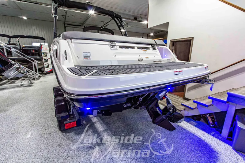 Slide: The Image of 2023 Bayliner VR6 Bowrider I/O displayed indoors with sleek design and modern features. - 4