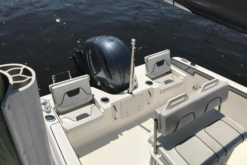 Slide: The Image of 2019 Wellcraft 202 Fisherman boat with Yamaha engine, featuring comfortable seating and sleek design. - 3