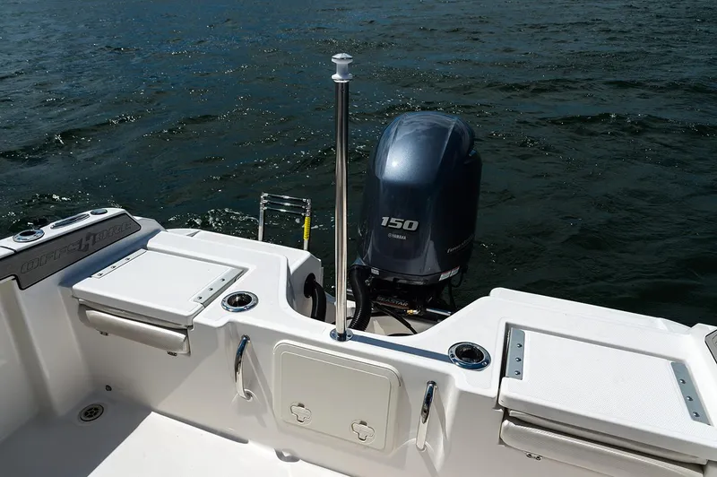 Slide: The Image of Manufacturer Provided Image: 2019 Wellcraft 202 Fisherman boat with Yamaha 150 outboard motor on water. - 8