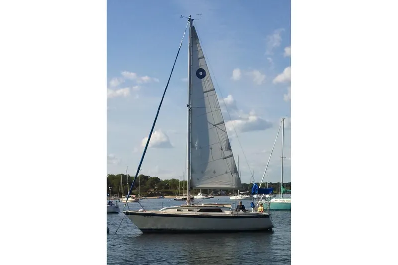 The Image of 1982 O'Day 28 sailboat on calm water under a clear sky. - 0