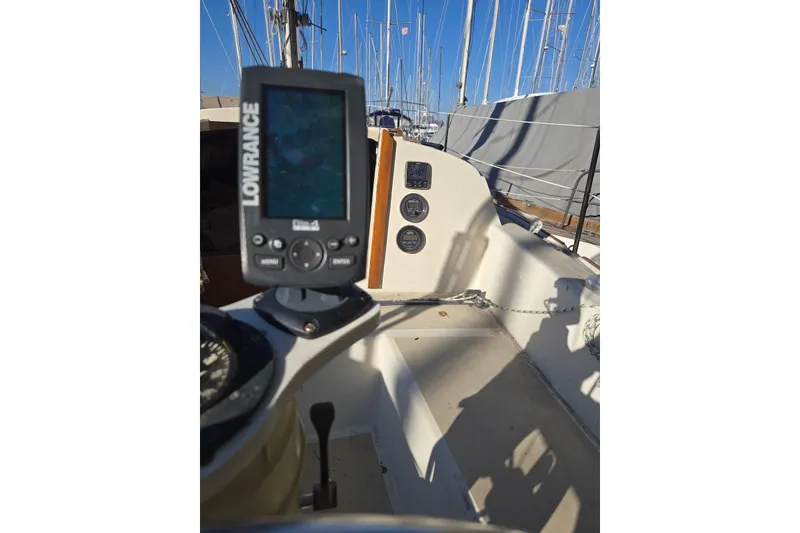 Slide: The Image of Cockpit of 1982 O'Day 28 sailboat with Lowrance navigation system. - 10