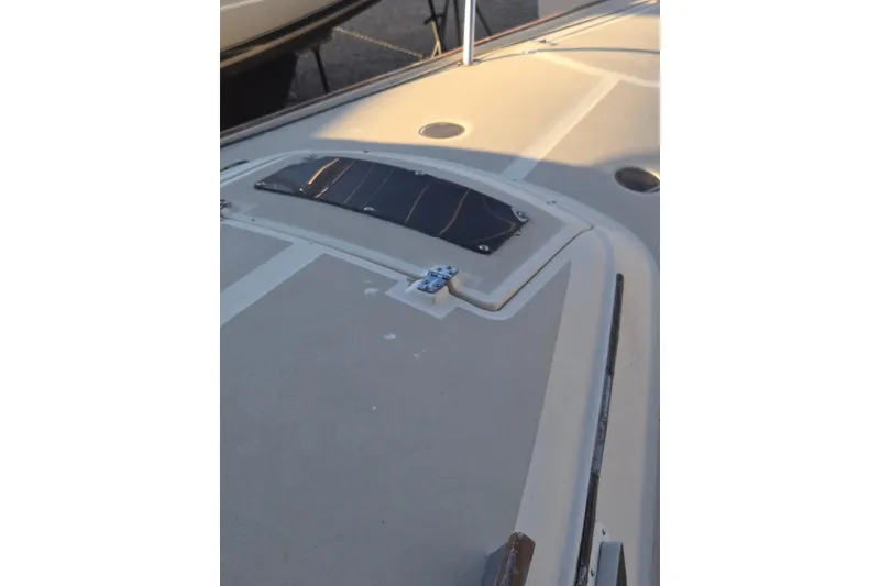 Slide: The Image of 1982 O'Day 28 sailboat deck with hatch and fittings, showcasing classic design. - 4
