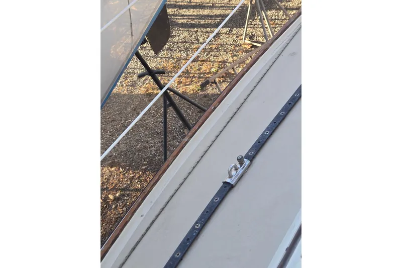 Slide: The Image of 1982 O'Day 28 sailboat on stands, showing deck and hardware details. - 5