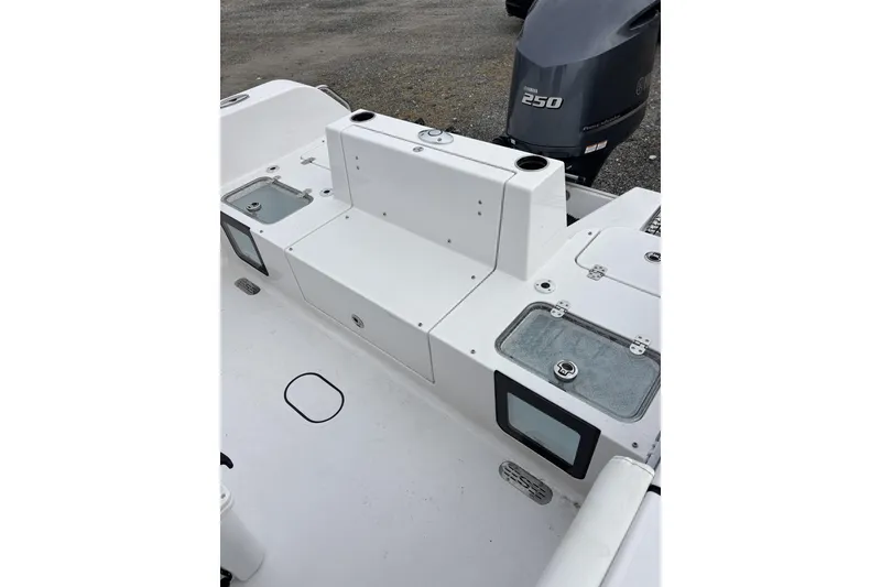 Slide: The Image of 2024 Sportsman Heritage 231 Center Console boat interior with Yamaha 250 engine. - 4