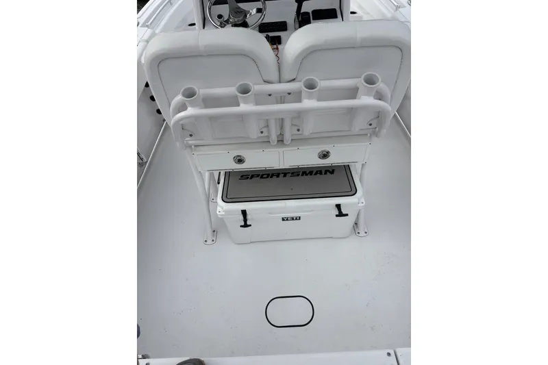 Slide: The Image of 2024 Sportsman Heritage 231 Center Console interior with seating and storage. - 9