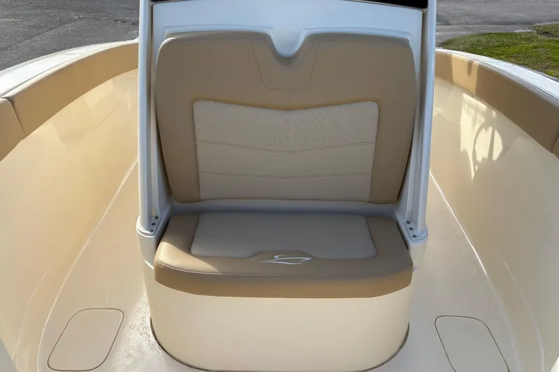 Slide: The Image of 2023 Scout 277 LXF boat interior seating with beige upholstery. - 32