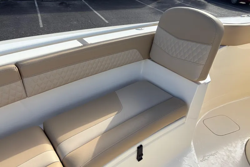Slide: The Image of 2023 Scout 277 LXF boat seating with beige upholstery and diamond stitching. - 37