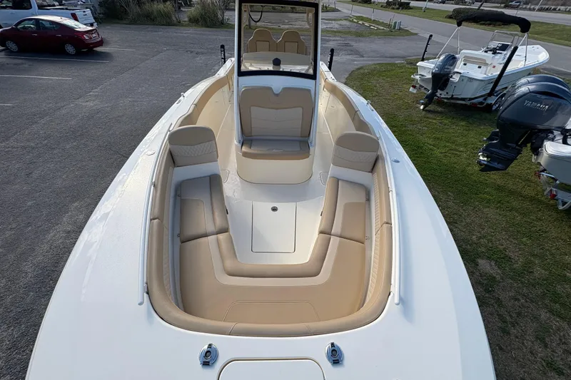 Slide: The Image of 2023 Scout 277 LXF boat with spacious seating and sleek design. - 39