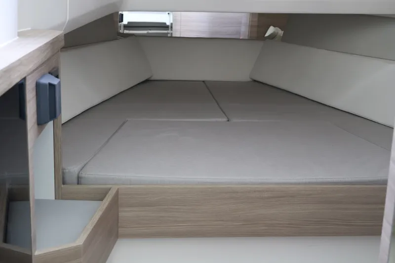 Slide: The Image of Interior of the 2027 Saxdor 400 GTO with gray cushions and wood paneling. - 38