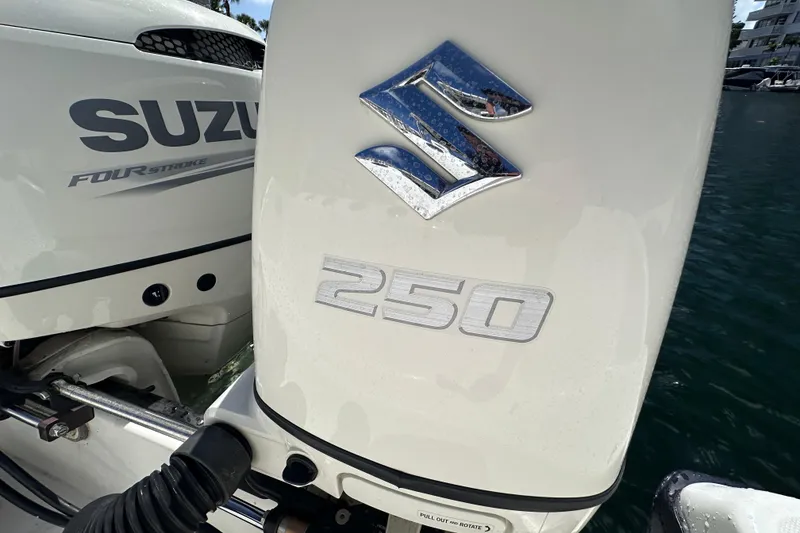 Slide: The Image of Suzuki 250 outboard engine on a 2006 Boston Whaler 285 Conquest boat. - 41
