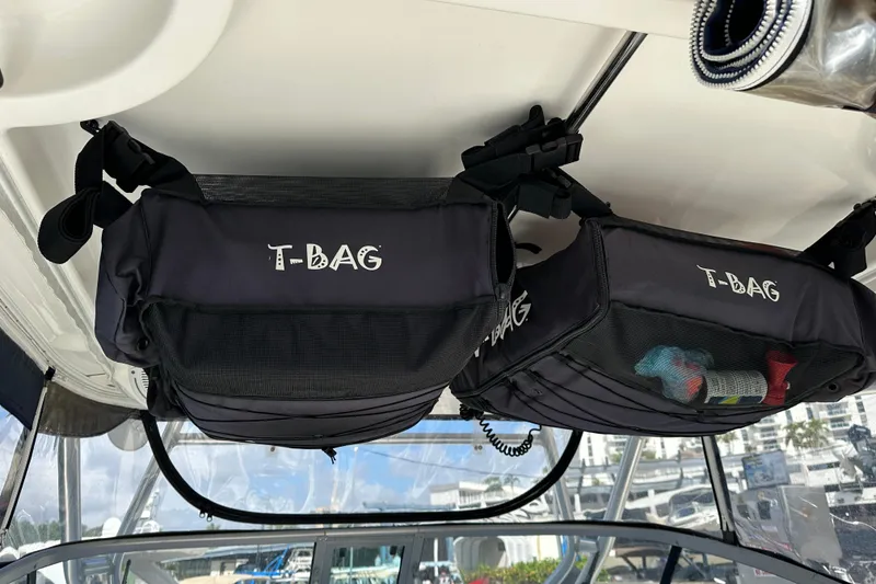Slide: The Image of T-Bag storage on 2006 Boston Whaler 285 Conquest boat, interior view. - 61