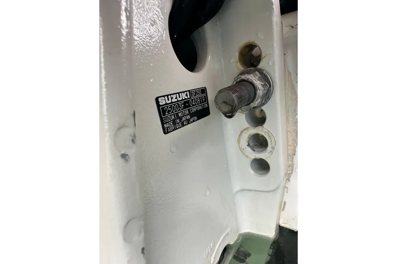 Slide: The Image of Close-up of Suzuki motor part on 2006 Boston Whaler 285 Conquest. - 95