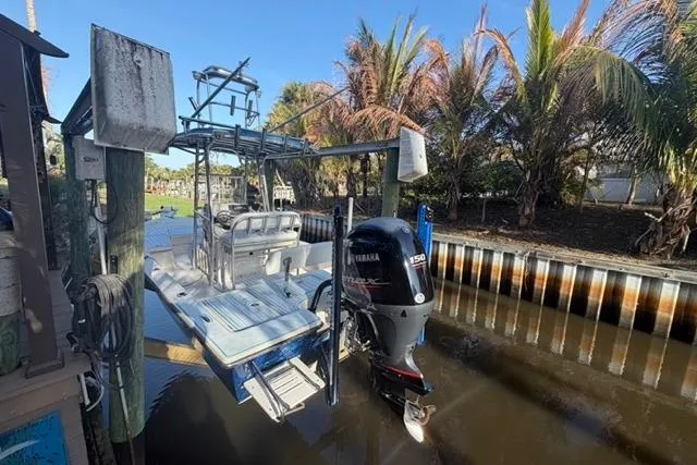 Slide: The Image of 2007 Pathfinder 2200 Tournament Edition boat docked with Yamaha outboard motor. - 12