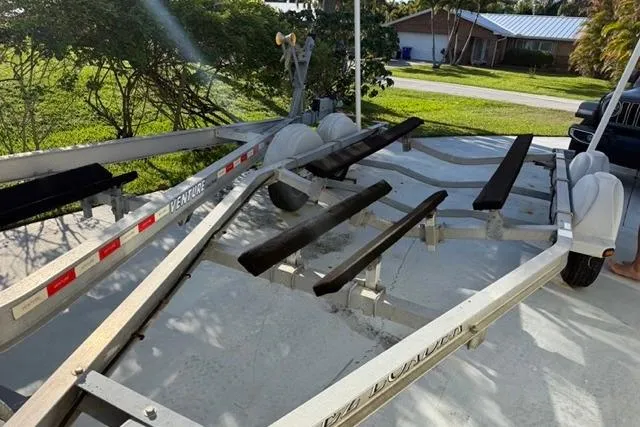 Slide: The Image of Trailer for 2007 Pathfinder 2200 Tournament Edition boat parked outdoors. - 17