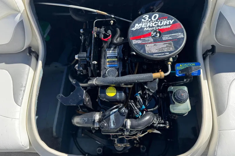 Slide: The Image of 2006 Bayliner 175 XT boat engine, featuring a 3.0L Mercury MerCruiser motor. - 17