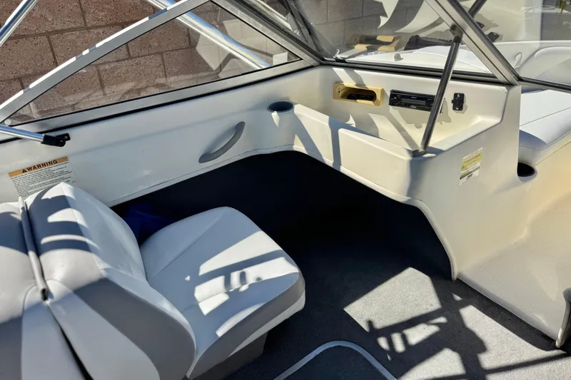 Slide: The Image of Interior of 2006 Bayliner 175 XT boat with seating and dashboard. - 18