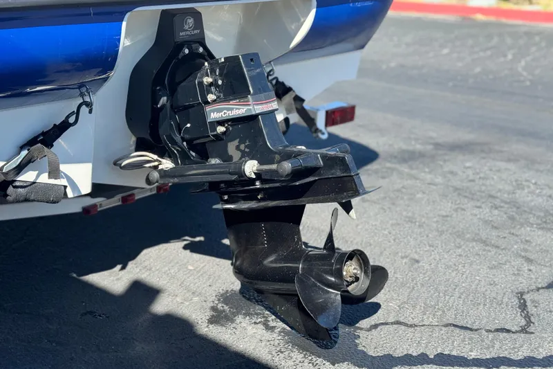 Slide: The Image of 2006 Bayliner 175 XT boat with MerCruiser outboard motor on a sunny day. - 7